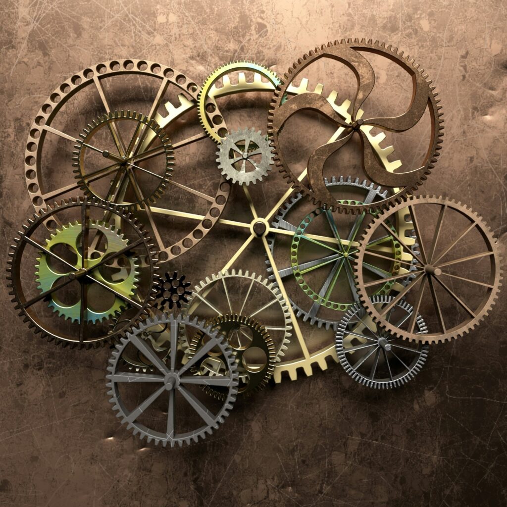Rouages et engrenages mécaniques imbriqués, illustrant les mécaniques et interactions dans les jeux de société